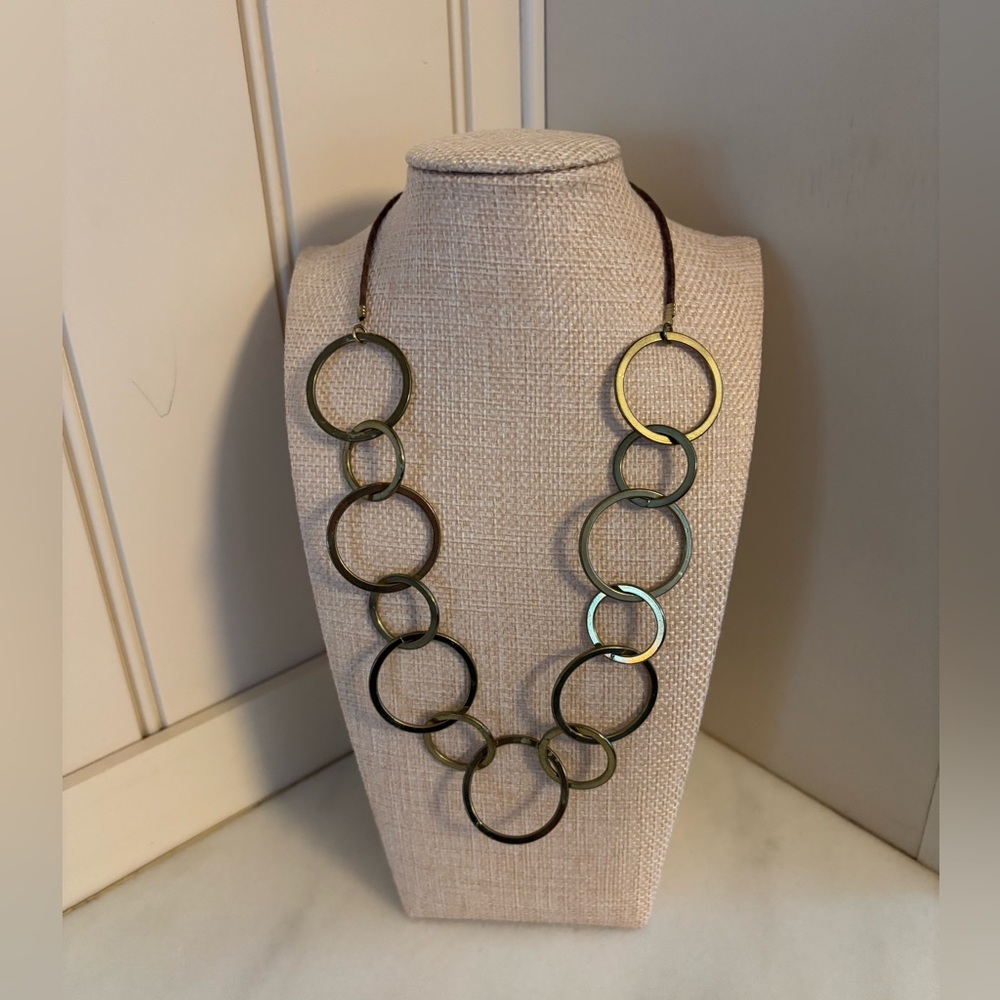 Retro metal necklace with leather cording